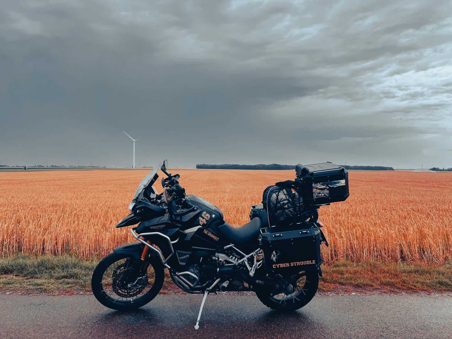 Cyber Struggle-branded motorcycle in an open field